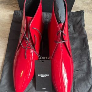 SAINT LAURENT JONAS 25 LACED ANKLE BOOTS WITH STACKED HEEL AND POINTED CUT-OUTS